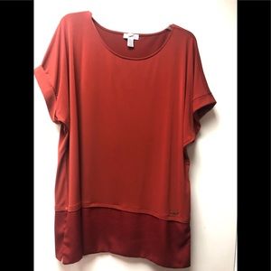 Calvin Klein soft, polyester spandex blouse; rust color